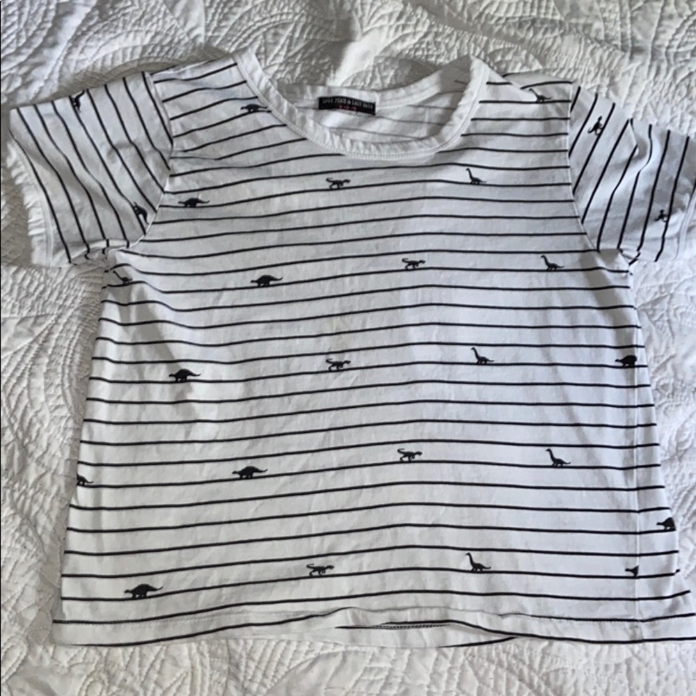 White and black striped shirt with dinosaurs